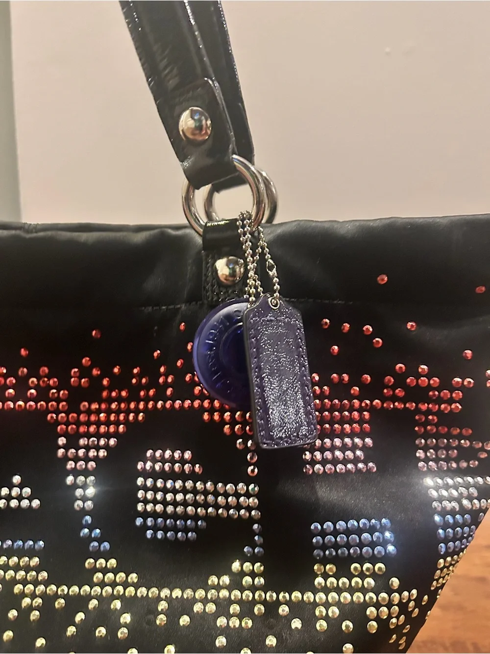Coach sleek black